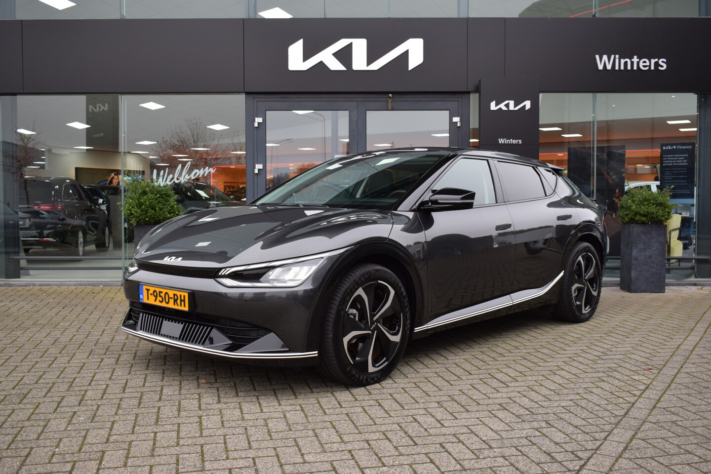 Kia EV6 - Plus Advanced 77.4 kWh 228pk ECC Cr.Control-Adapt. Navi+BT 360-Camera Leder+Verw.+Koeling - AutoWereld.nl