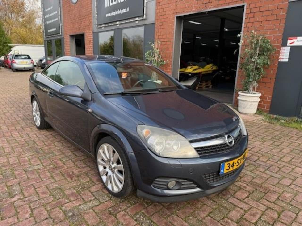 Opel Astra TwinTop - 1.8 Cosmo Airco, LEER - AutoWereld.nl