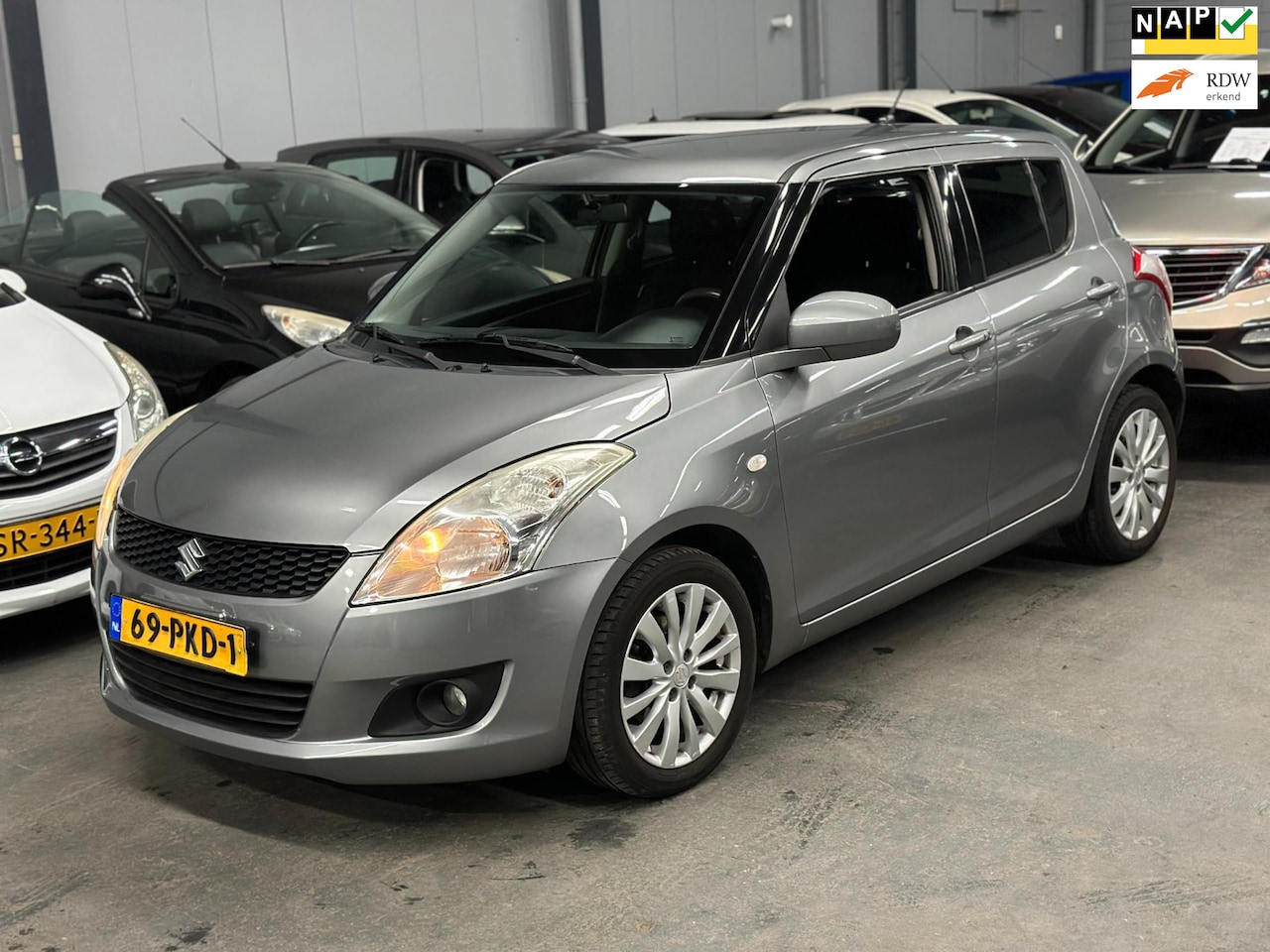 Suzuki Swift - 1.2 Exclusive EASSS Keyless Stoelverwarming 3de Eigenaar APK NAP - AutoWereld.nl