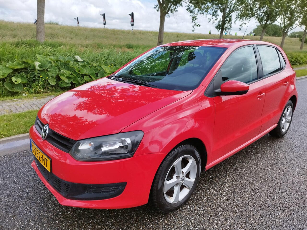 Volkswagen Polo - 1.2-12V ** 5 DRS ** 113.118 KM ** NAVI ** Airco ** LM velgen ** - AutoWereld.nl