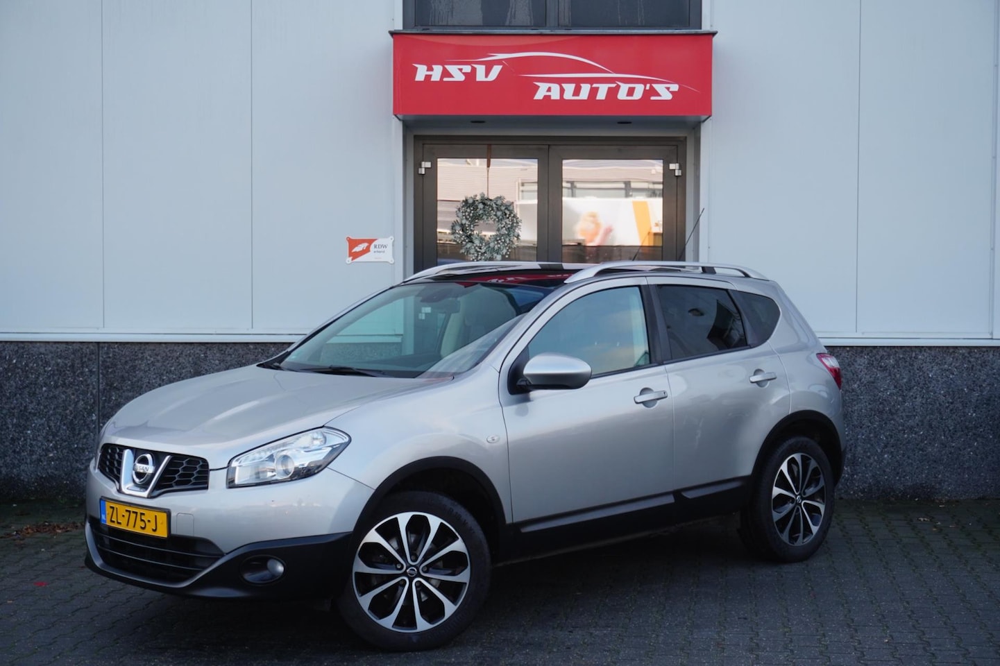 Nissan Qashqai - 1.6 Visia navi LM airco cruise - AutoWereld.nl