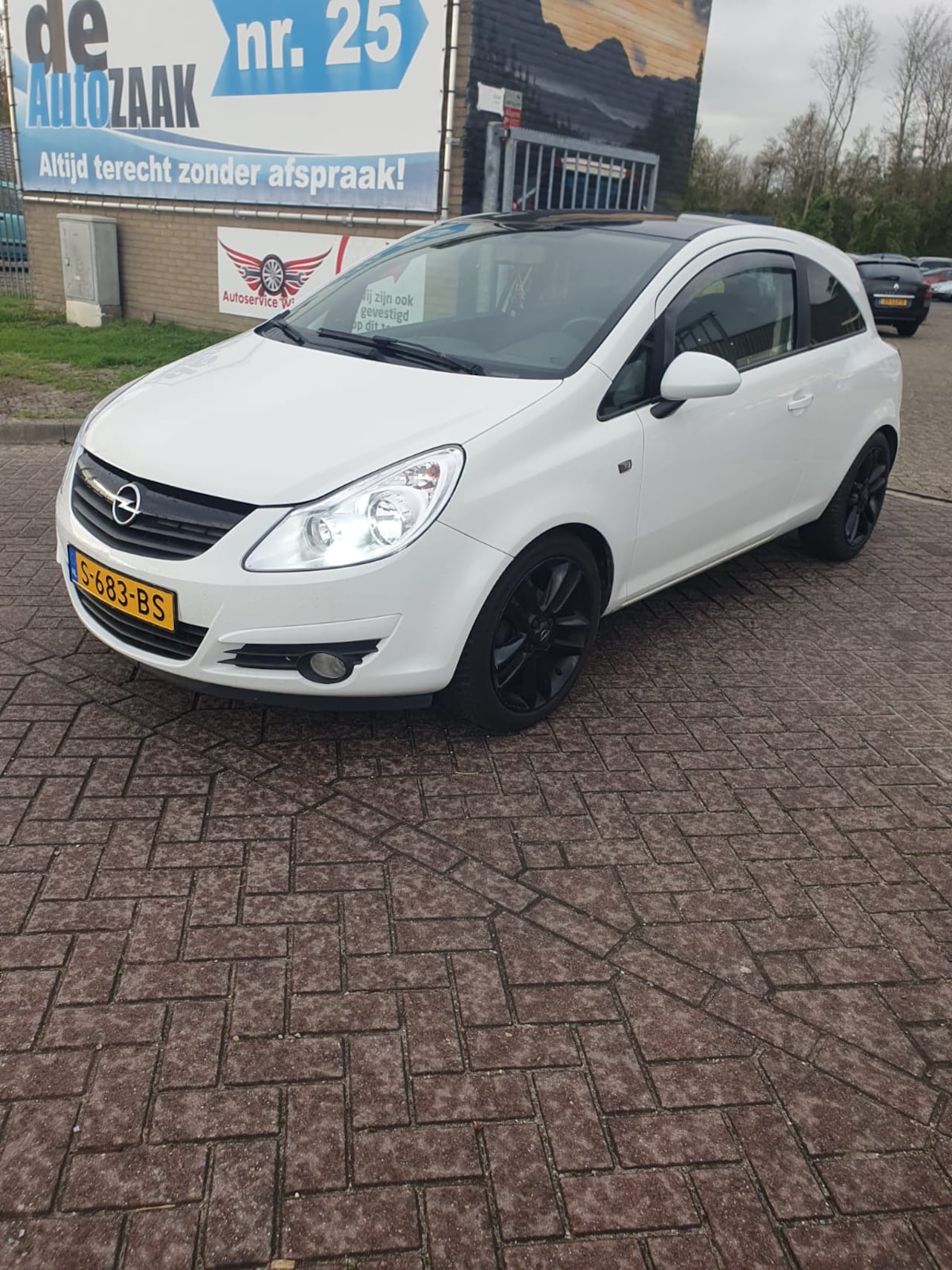 Opel Corsa - 1.2-16V Enjoy Airco - AutoWereld.nl