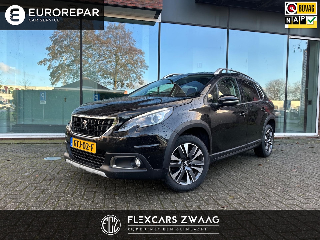 Peugeot 2008 - 1.2 PureTech Allure - Automaat- Navi - Climate - Half leder - Camera - AutoWereld.nl