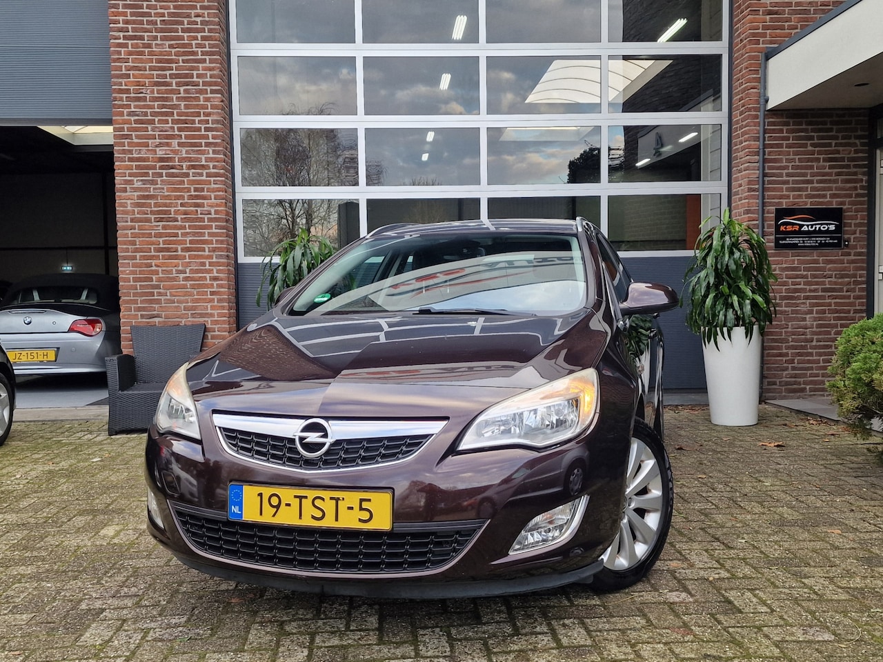 Opel Astra Sports Tourer - 1.4 Turbo Cosmo|LM velgen|Trekhaak|Airco|Navi|Nap - AutoWereld.nl