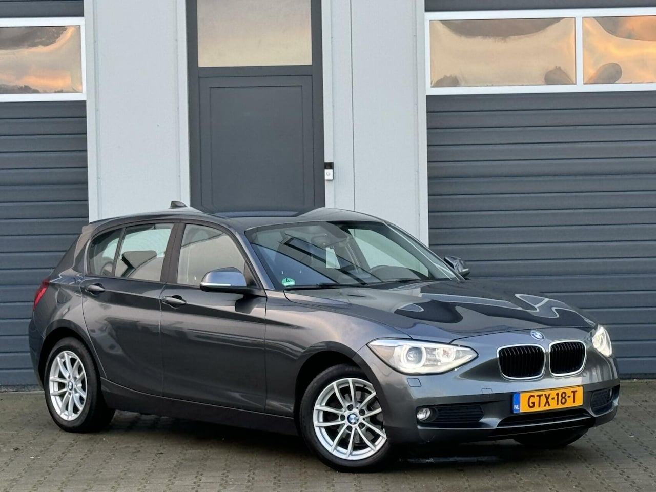 BMW 1-serie - 116i EDE Business Sport / Xenon / Led / Clima - AutoWereld.nl