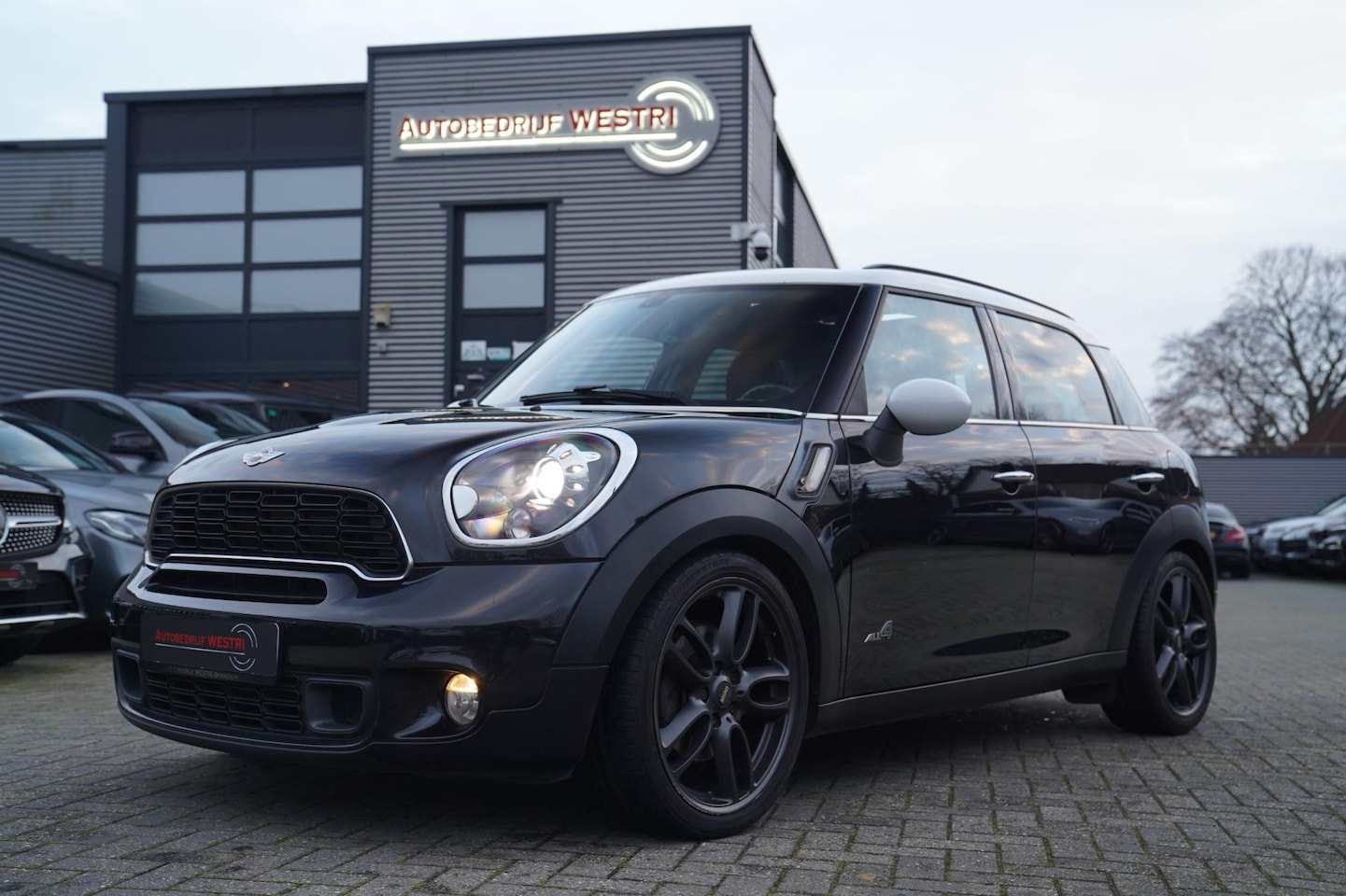 MINI Countryman - Mini 1.6 Cooper S ALL4 Chili | Panorama | Luxe Leder | Automaat | Stoelverwarming | Climat - AutoWereld.nl