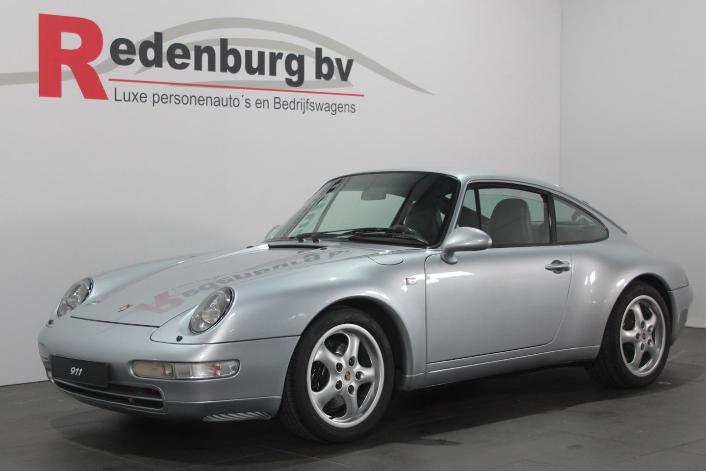 Porsche 911 - 993 / 3.6 Coupé / Lucht gekoeld - Aut. / Leder Bekl. / Originele Staat. - AutoWereld.nl