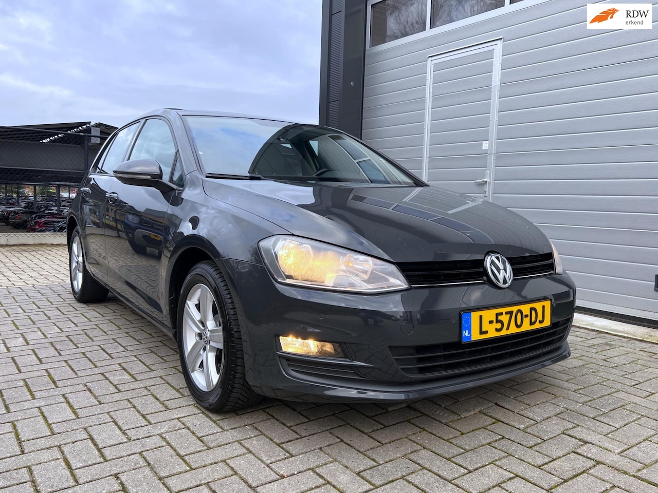 Volkswagen Golf - 1.4 TSI 140pk ACT Comfortline - Navigatie - Schuif-/Kanteldak - Cruise Control - PDC - Blu - AutoWereld.nl