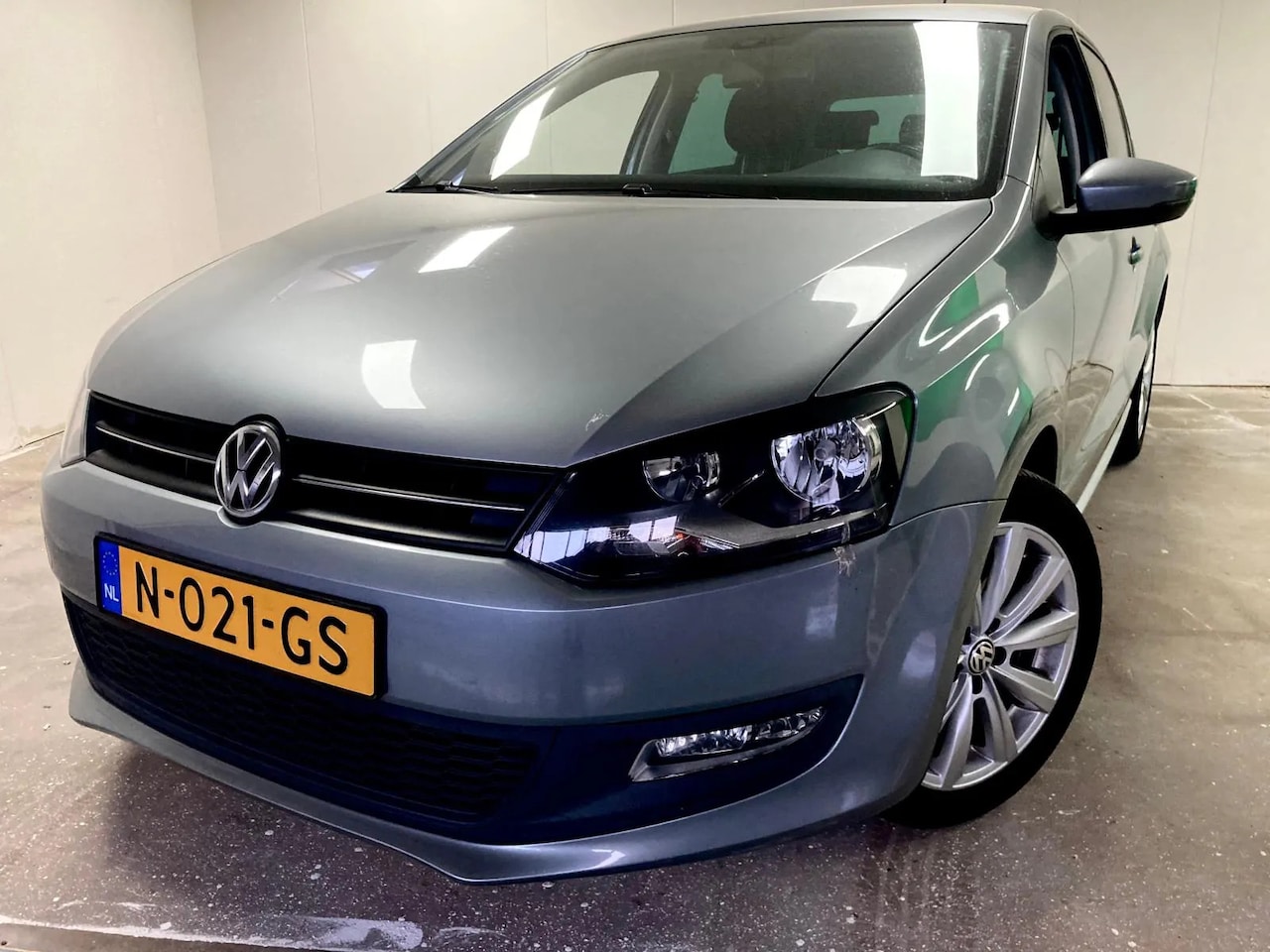 Volkswagen Polo - 1.2 70pk highline - AutoWereld.nl