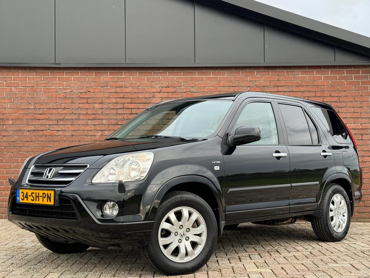 Honda CR-V - 2.0i EXECUTIVE 4WD | NL-AUTO | LEDER | SCHUIFDAK! - AutoWereld.nl