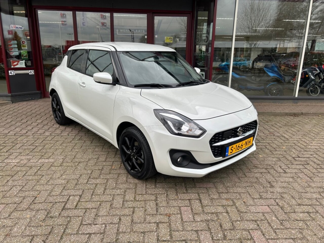 Suzuki Swift - 1.2 STYLE SMART HYBR - AutoWereld.nl