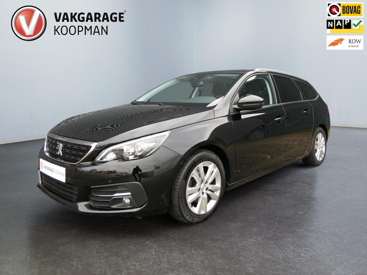 Peugeot 308 SW - 1.2 PureTech Blue Lease Executive Panoramadak/Navi/Cruise/Airco. - AutoWereld.nl