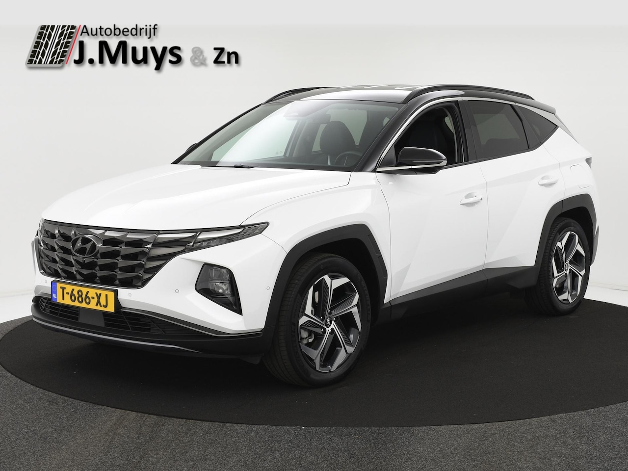 Hyundai Tucson - 1.6 T-GDI 265PK PHEV Premium 4WD TREKH|LEER|ACC|BLIS|MEMORYSTOEL|WINTERPACK|360CAMERA|NAVI - AutoWereld.nl