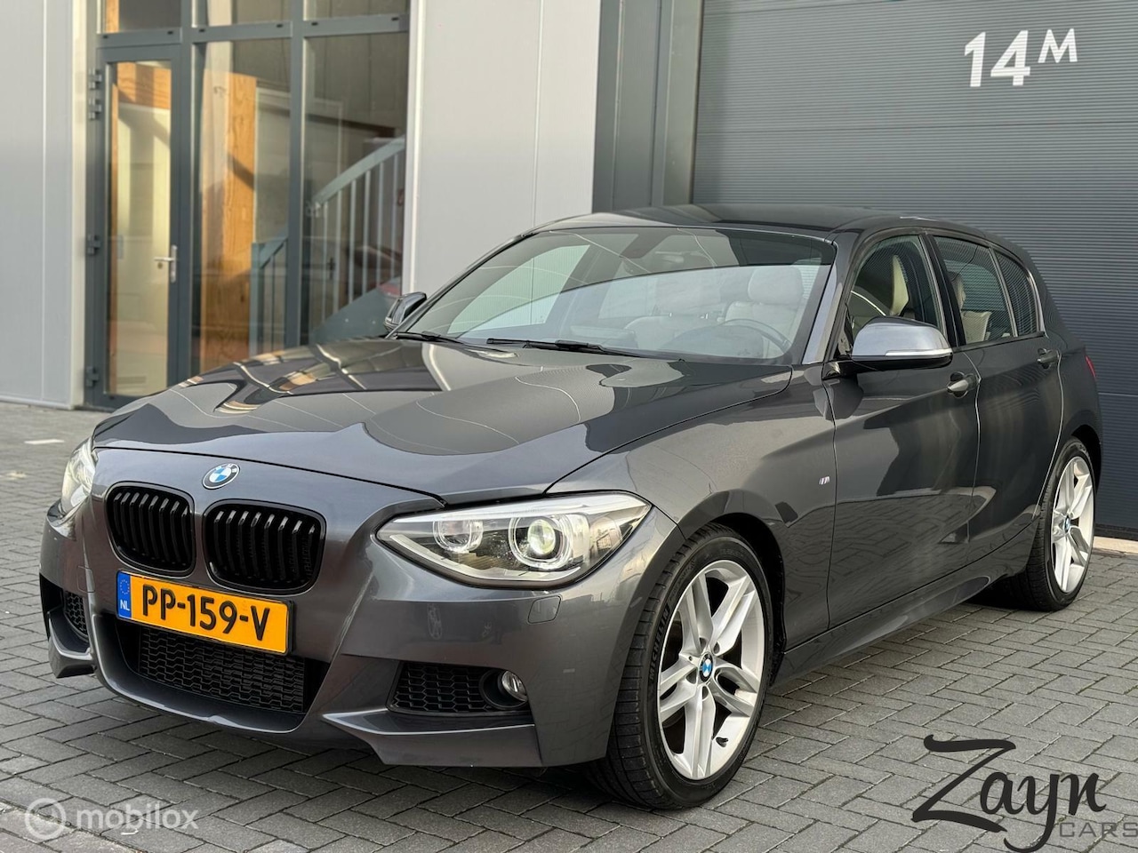 BMW 1-serie - 125D High Executive | M-Pakket | Xenon | Leder | - AutoWereld.nl