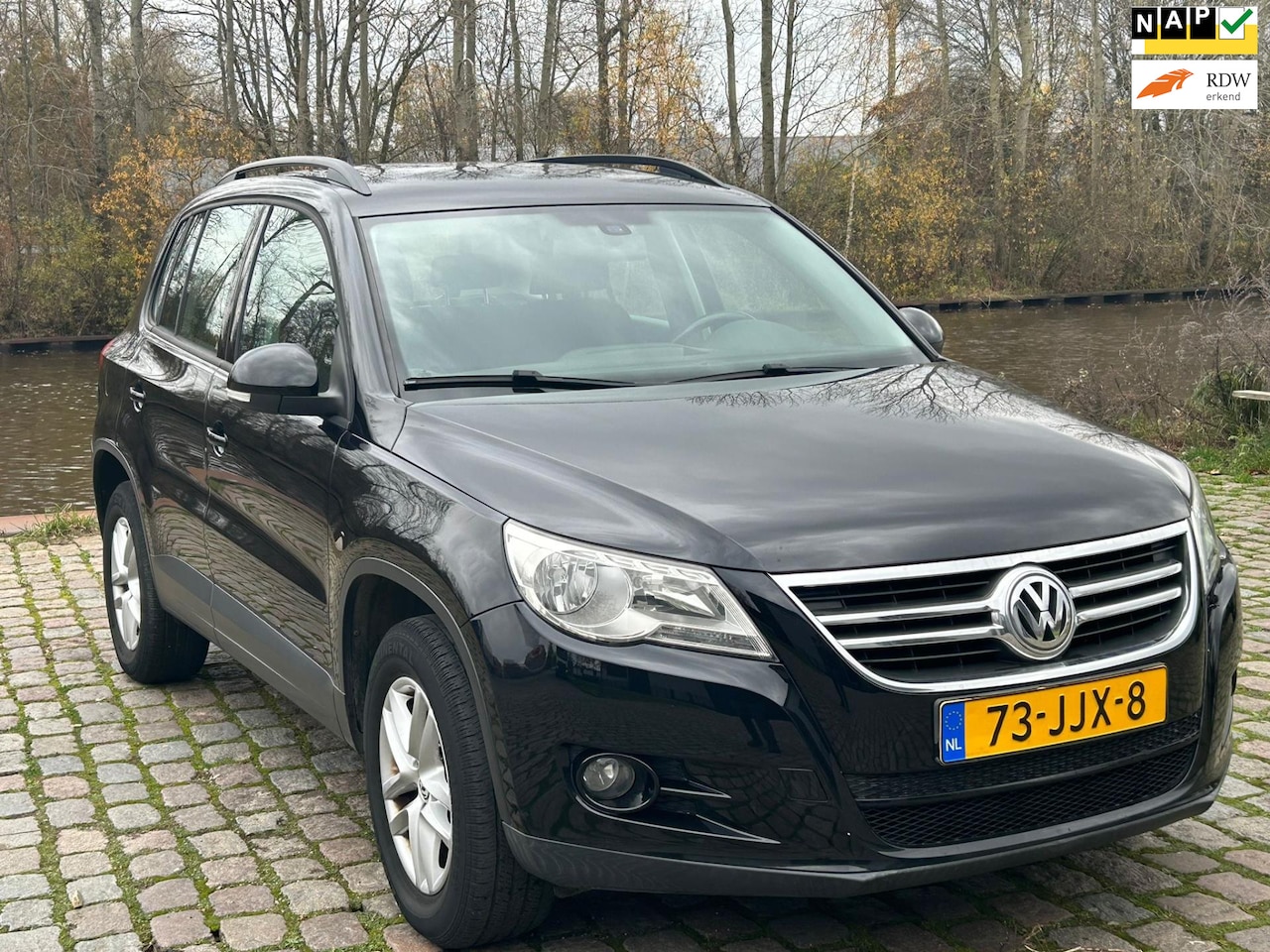 Volkswagen Tiguan - 2.0 TSI Comfort&Design 4Motion 1e eigenaar Automaat airco elektrische ramen cv op afs crui - AutoWereld.nl