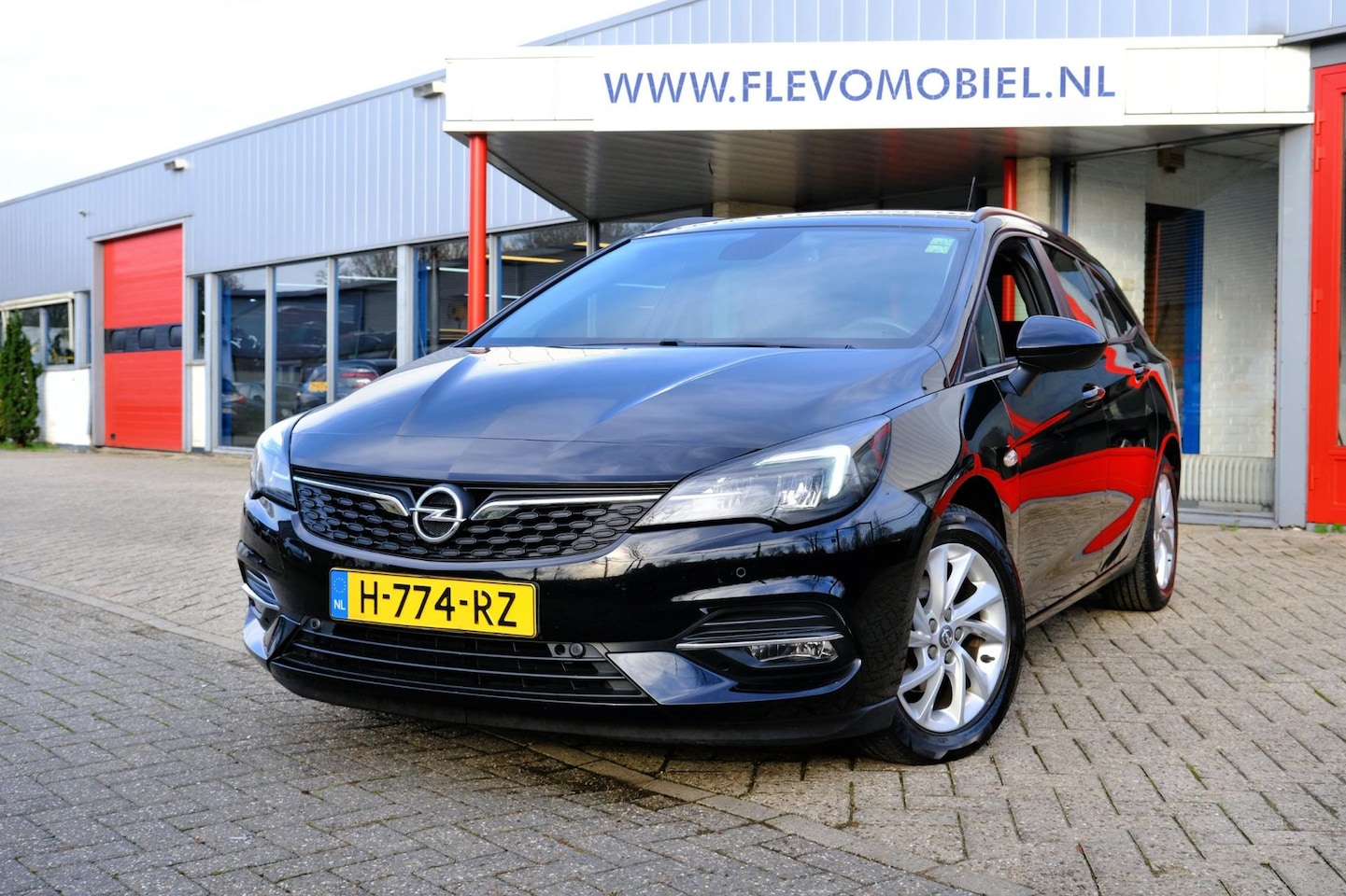 Opel Astra Sports Tourer - 1.2 Business Edition Navi|Cam|Clima|Apple CarPlay - AutoWereld.nl