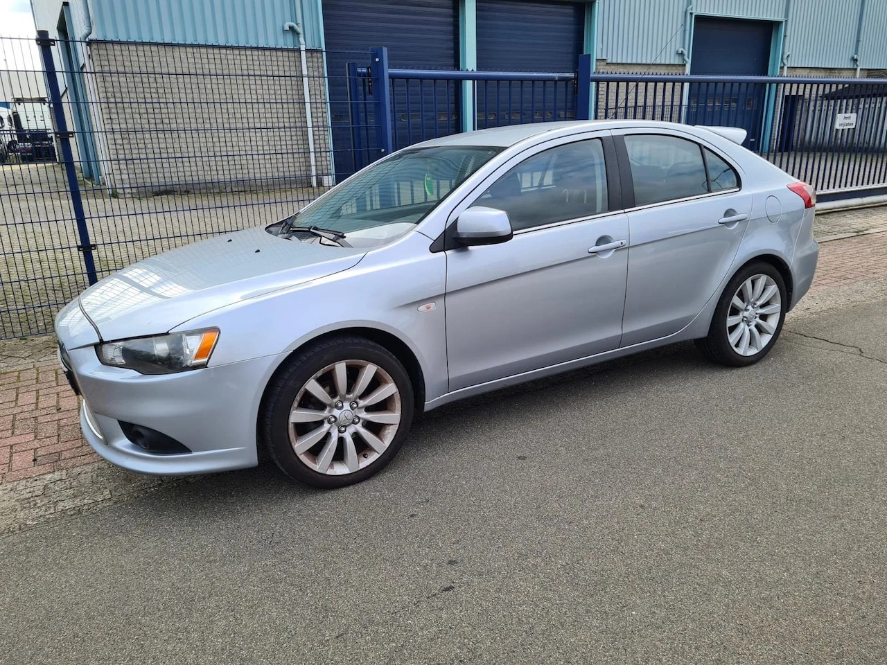 Mitsubishi Lancer Sportback - 1.8 Invite *AIRCO*CV*ELEC.RAMEN*18 INCH - AutoWereld.nl