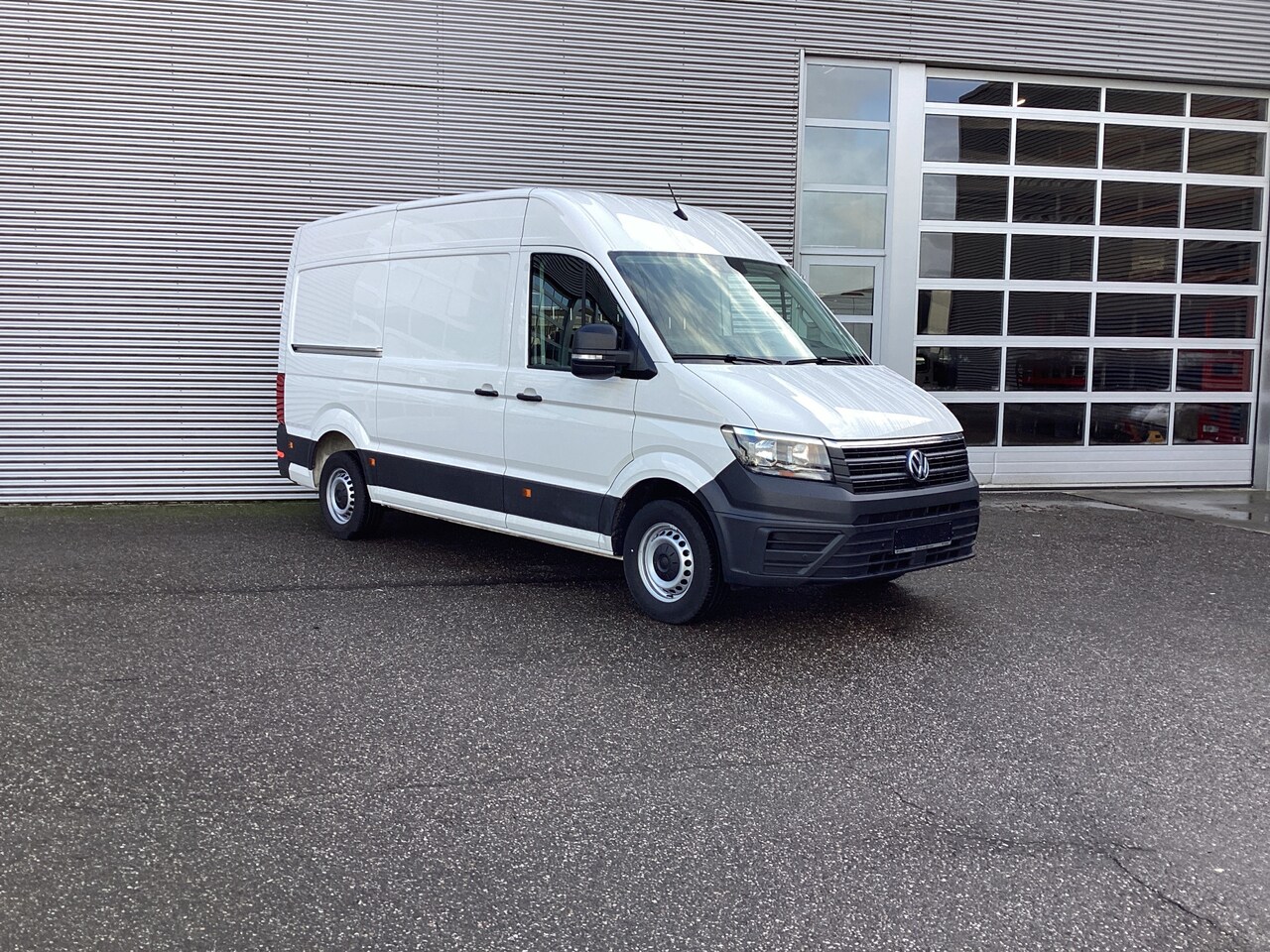 Volkswagen Crafter - 35 2.0 TDI 140 pk L3H3 CarPlay/ PDC/ Airco - AutoWereld.nl