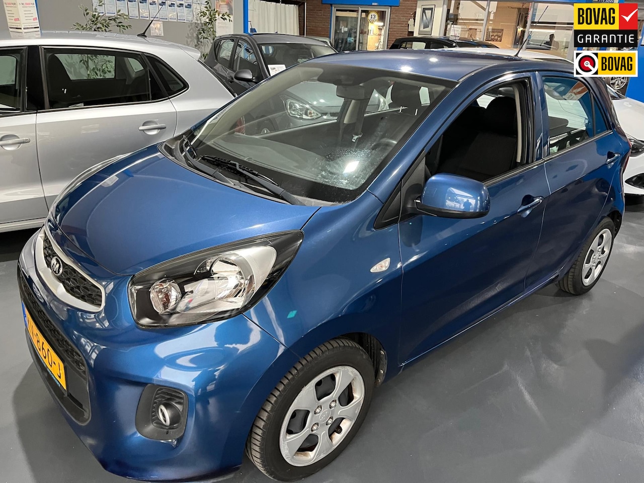 Kia Picanto - 1.0 CVVT Summer Edition 1.0 CVVT Summer Edition - AutoWereld.nl