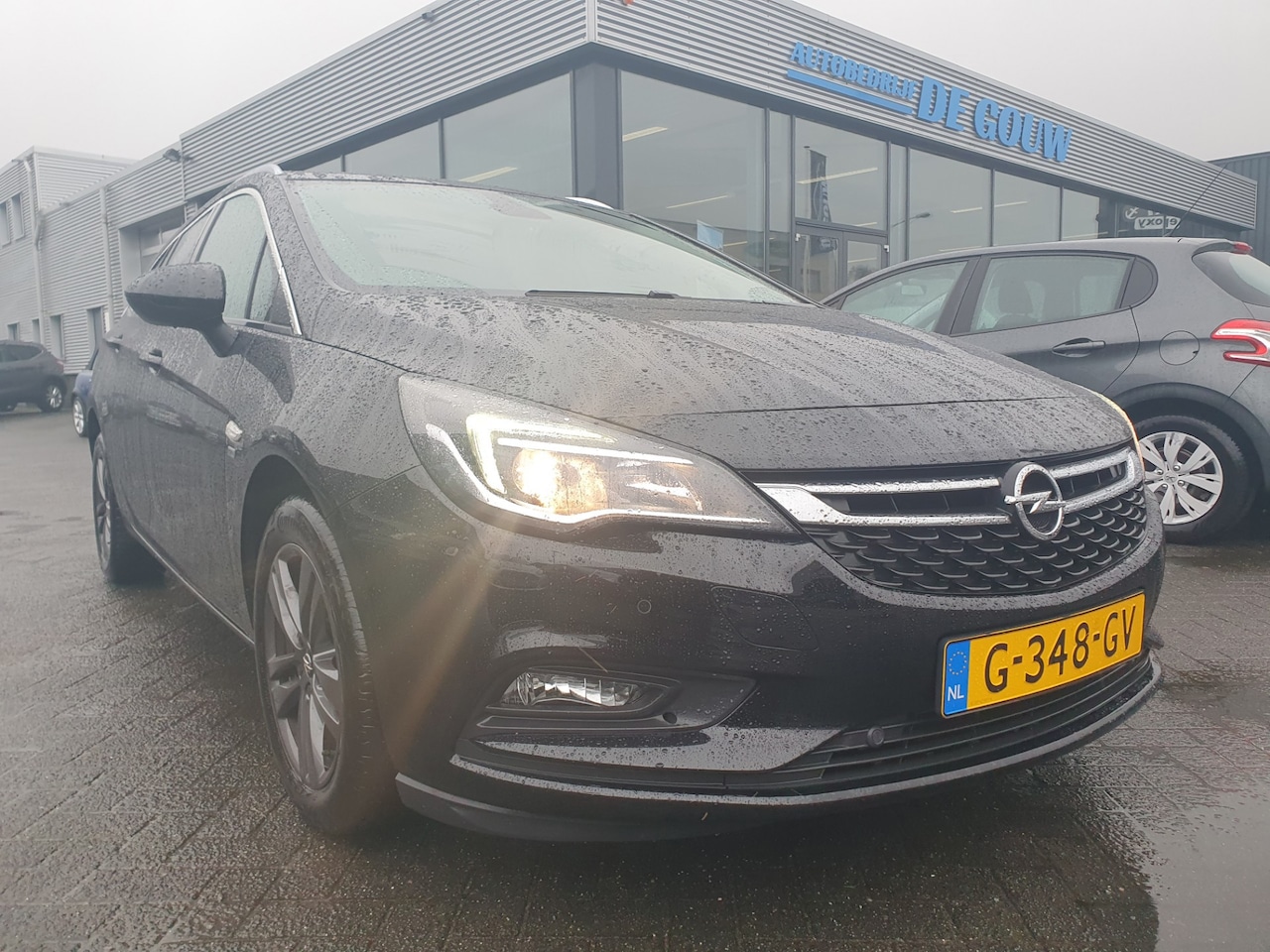 Opel Astra Sports Tourer - 1.0 Turbo 120 Jaar Edition 1.0 Turbo 120 Jaar Edition - AutoWereld.nl