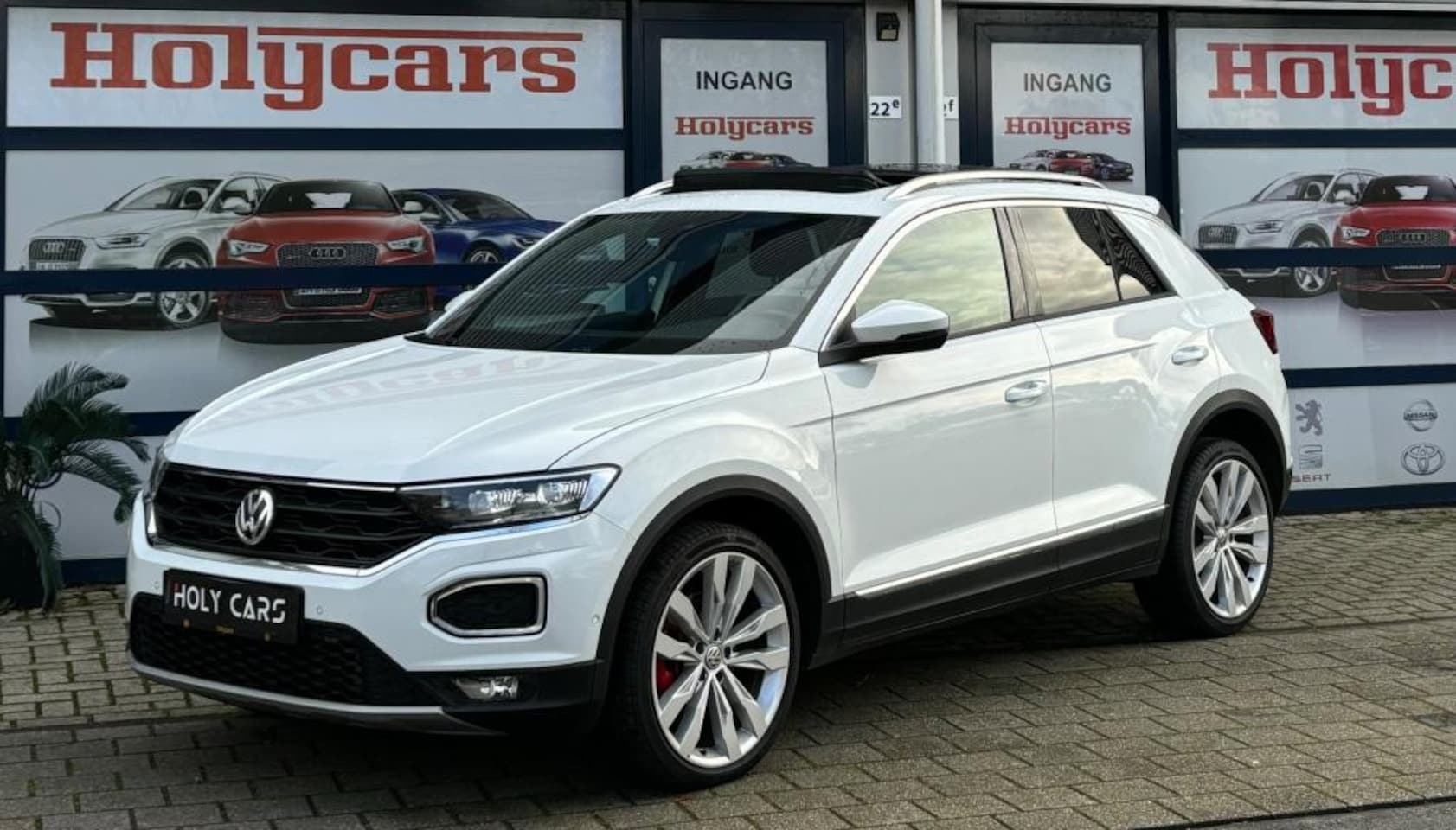 Volkswagen T-Roc - 2.0 TSI 4Motion Sport AUTOMAAT | VIRTUAL | PANO | LED | - AutoWereld.nl