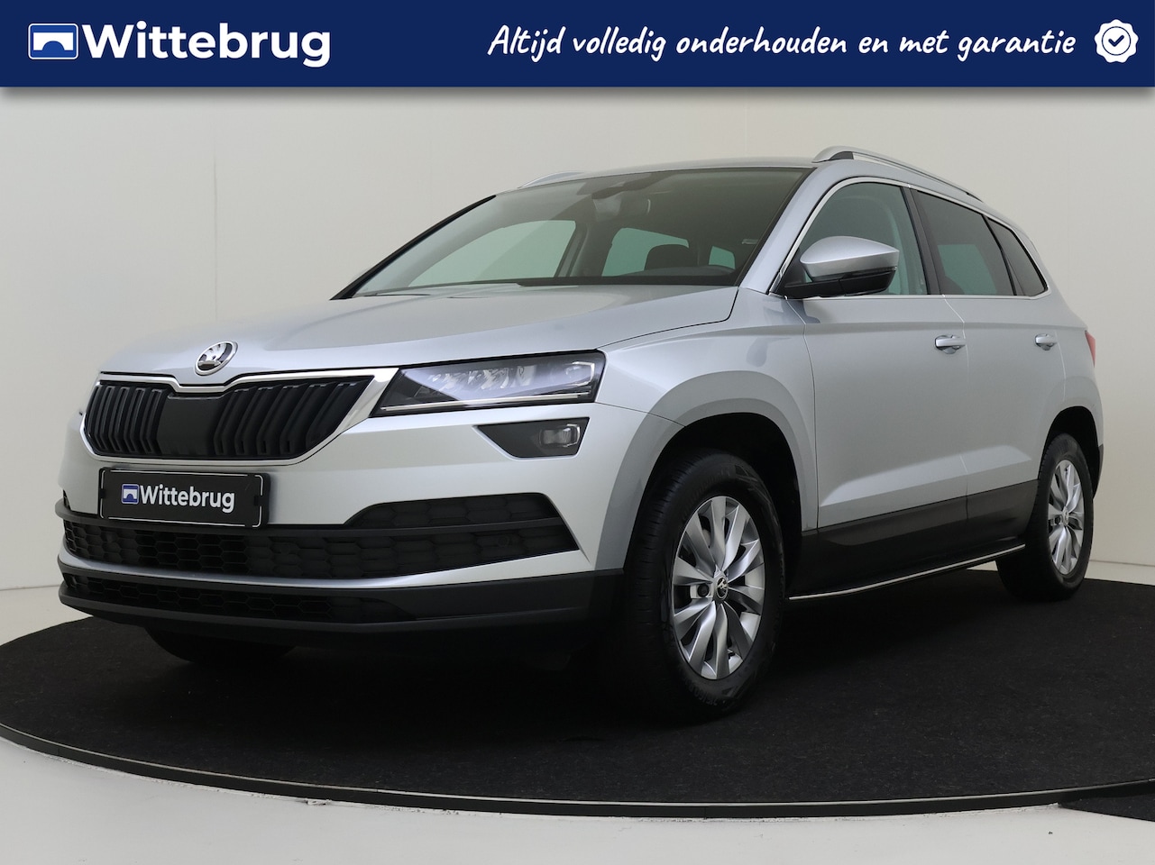 Skoda Karoq - 1.0 TSI Clever Edition Automaat | Navigatie | Camera | Stoelverwarming - AutoWereld.nl