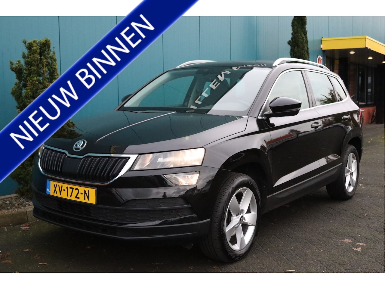 Skoda Karoq - 1.0 TSI Ambition Business ECC/CRUISE/CARPLAY/BLUETOOTH/NAV/PDCA.R.CAM/LMV - AutoWereld.nl