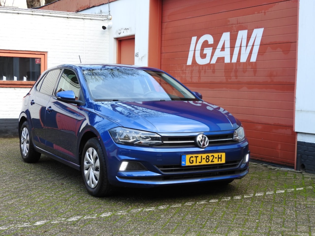 Volkswagen Polo - 1.0 TSI Comf.l. Bus. Airco, CC, stoelverw. - AutoWereld.nl