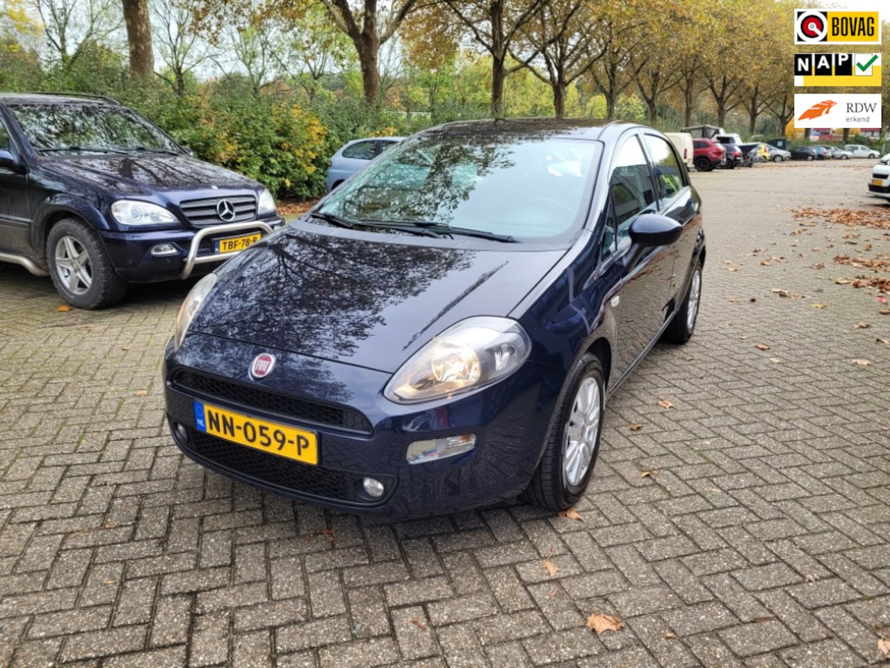 Fiat Punto Evo - 0.9 TwinAir Lounge 0.9 TwinAir Lounge, airco, lichtmetaal, 6 bak, sportstoelen, zeer nette auto - AutoWereld.nl