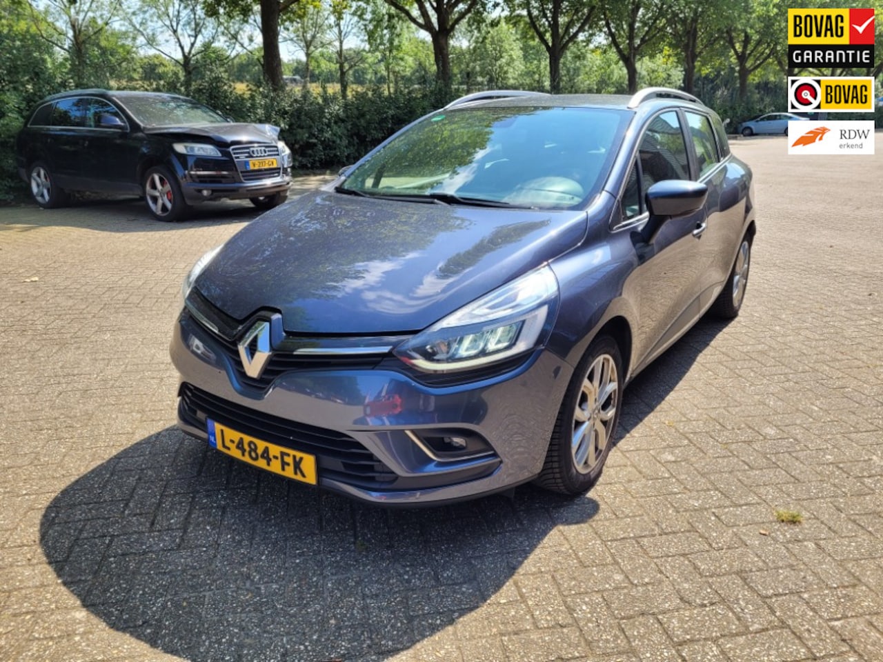 Renault Clio Estate - 1.2 TCe Intens 1.2 TCe Intens, LED verlichting, climate control, keyless entry, 6 bak, half leer, all-sea - AutoWereld.nl