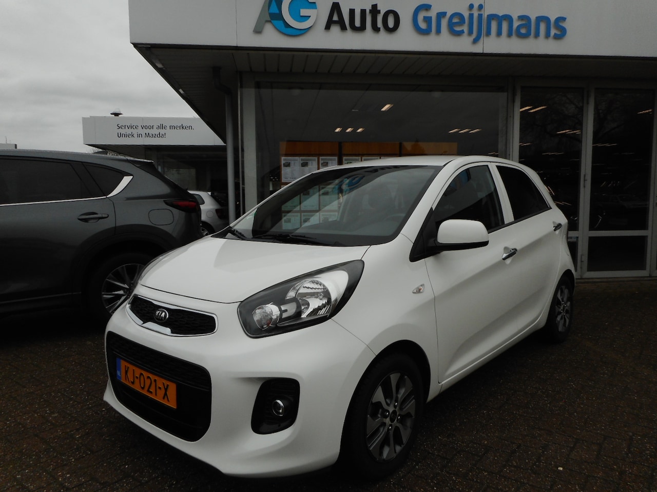 Kia Picanto - 1.0 CVVT ComfortPlusLine Navigator 1.0 CVVT ComfortPlusLine Navigator - AutoWereld.nl