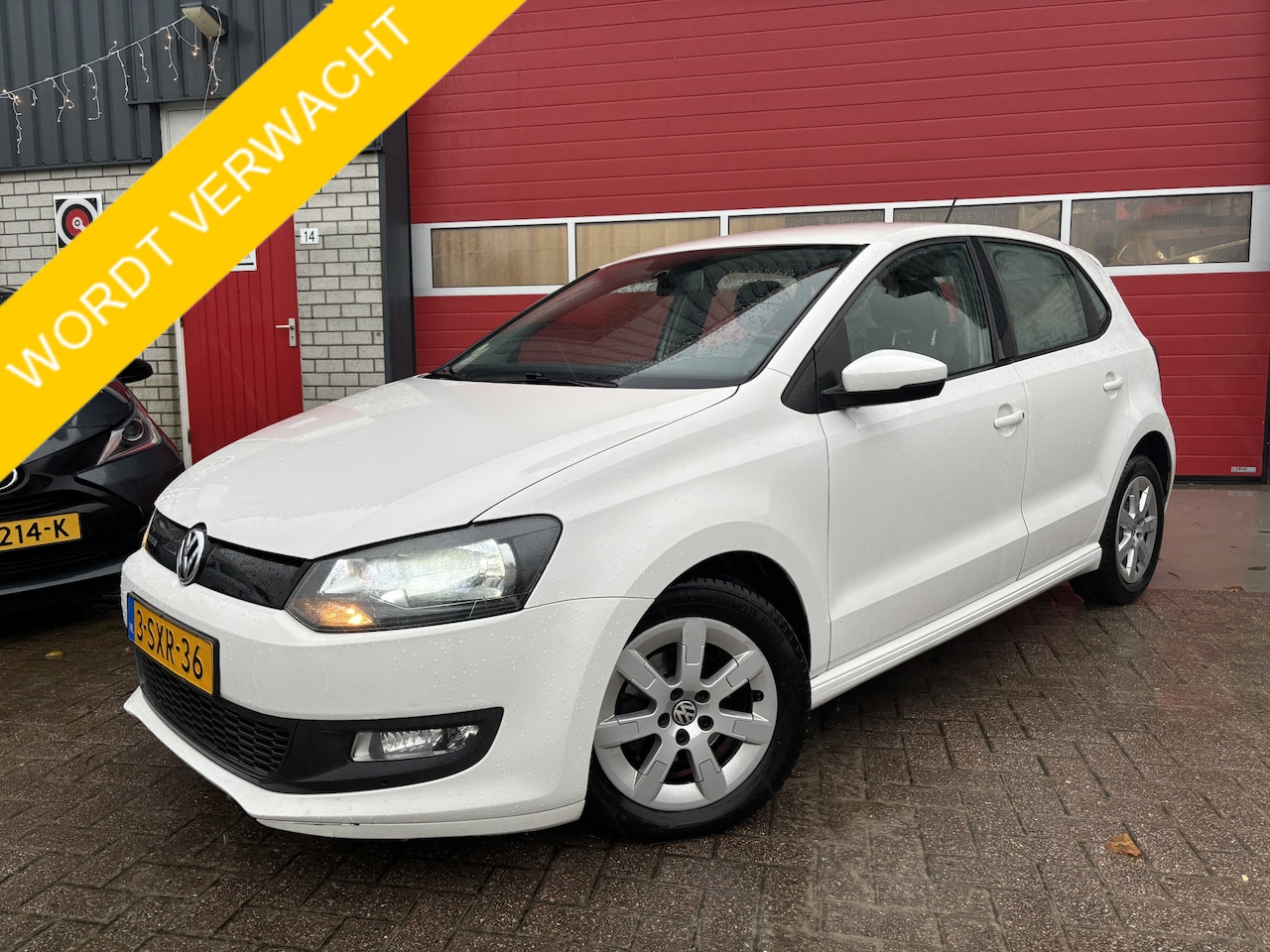 Volkswagen Polo - 1.2 TDI BlueMotion TREKHAAK / NAVI / PDC / BLUETOOTH / AIRCO / CRUISE / NL-AUTO - AutoWereld.nl