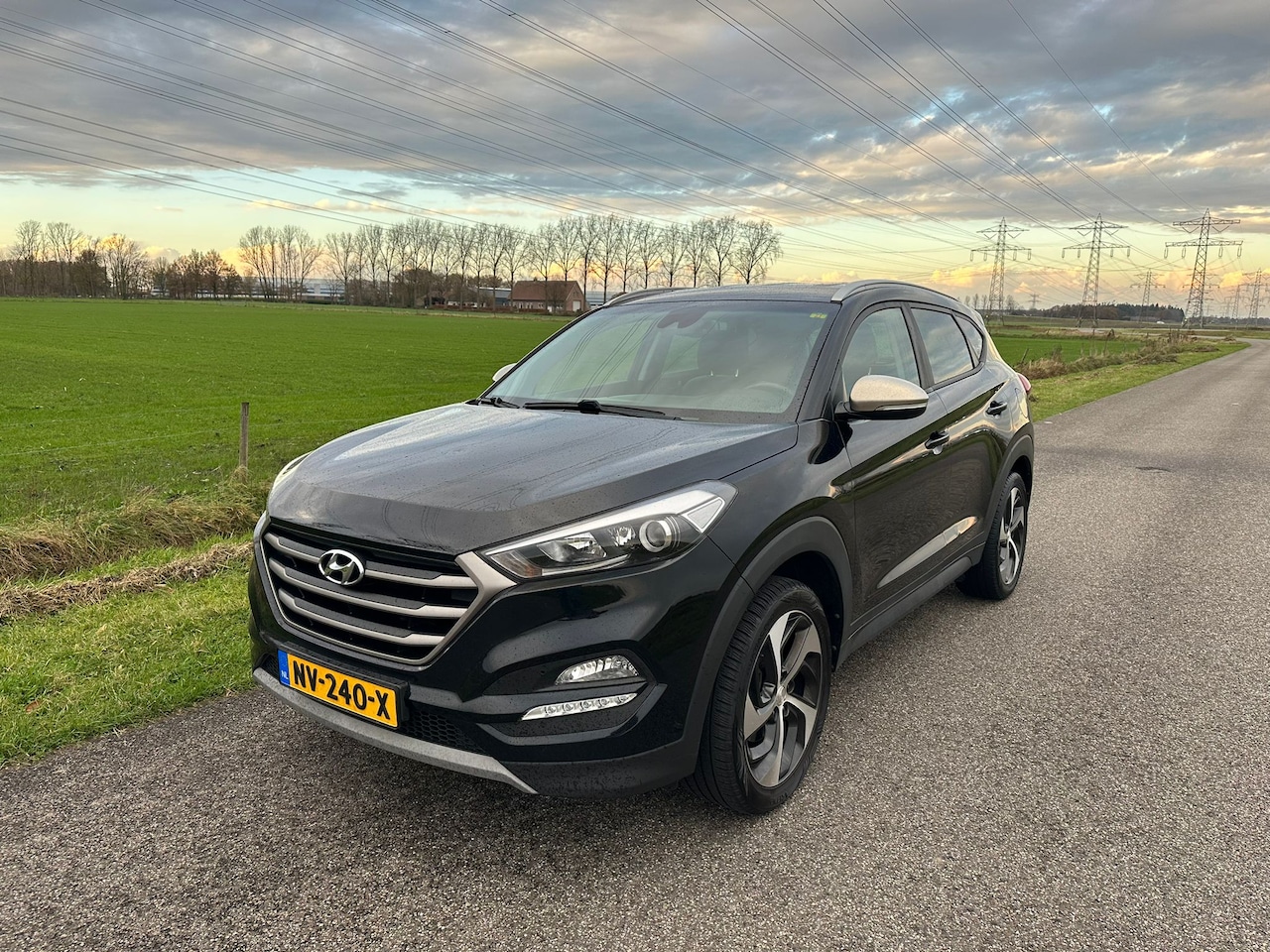 Hyundai Tucson - 1.6 GDi Anniversary Edition TREKHAAK / NAVI / CAMERA / NIEWE KETTING / NAP ! - AutoWereld.nl