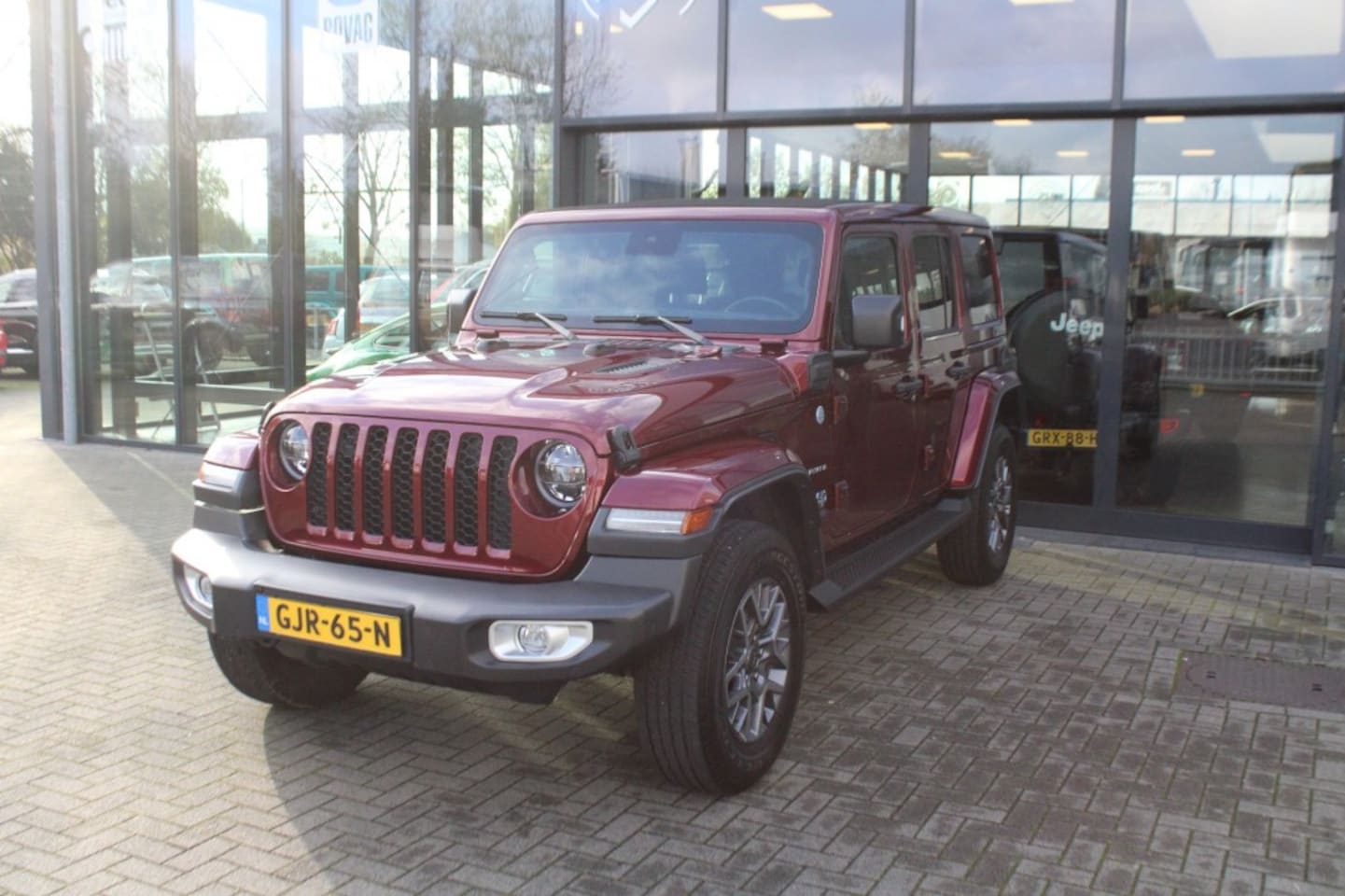 Jeep Wrangler - 4XE 380 SAHARA / Plug In Hybrid / My Sky open dak 25.294KM - AutoWereld.nl