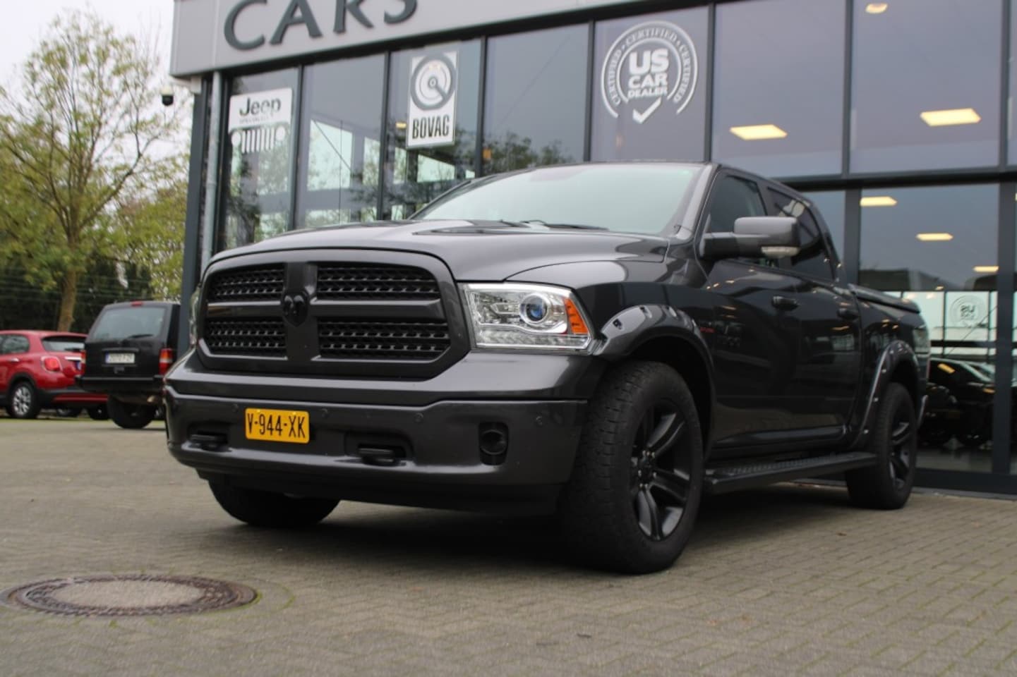 Dodge Ram Pick Up - 5.7i V8 HEMI 4x4 Aut. LARAMIE Black Pack / Luchtvering - AutoWereld.nl