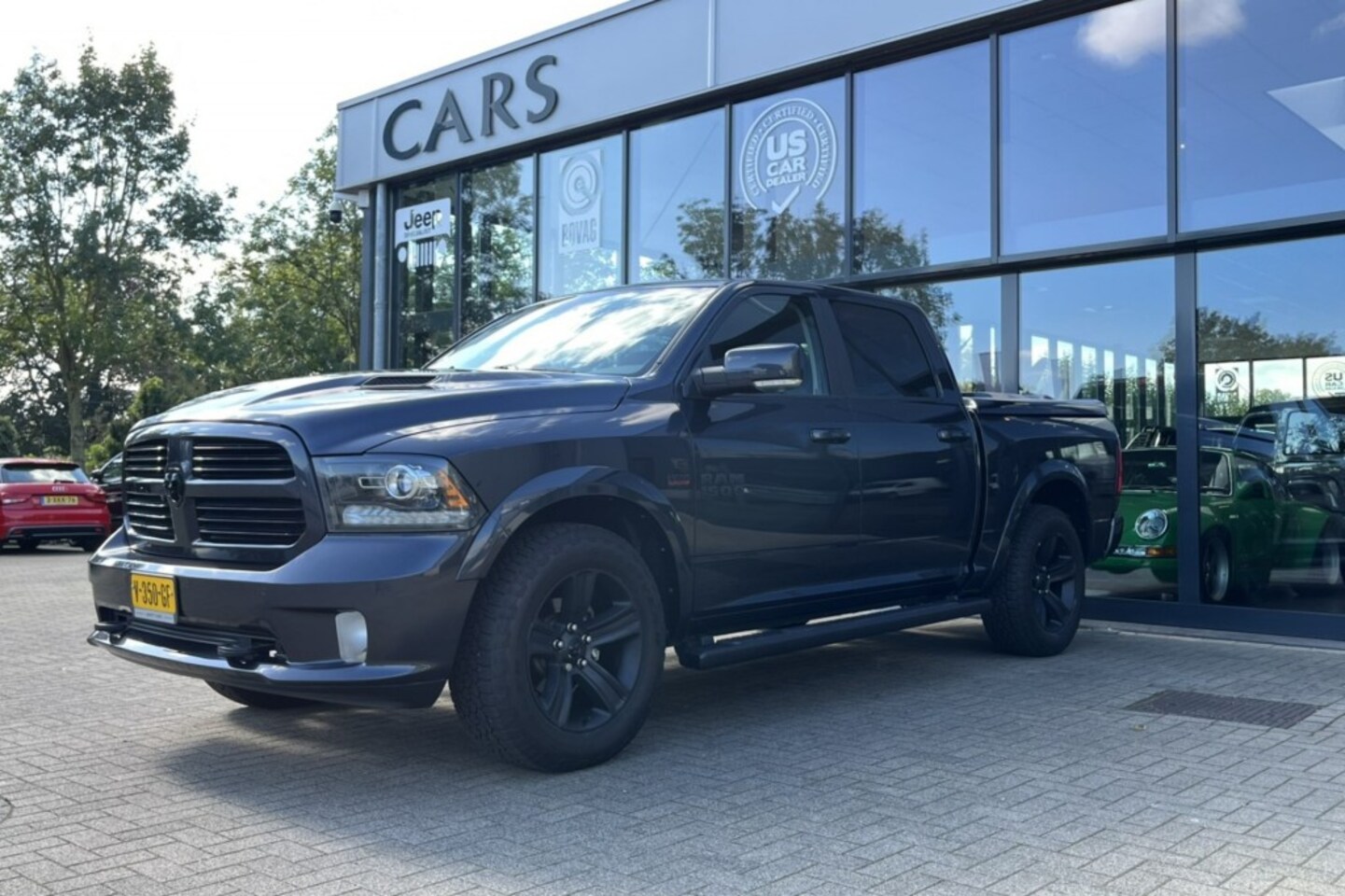 Dodge Ram - 5.7i V8 HEMI Sport 4x4 Aut. NIGHT EDITION / LPG G3 / 1e eigenaar - AutoWereld.nl