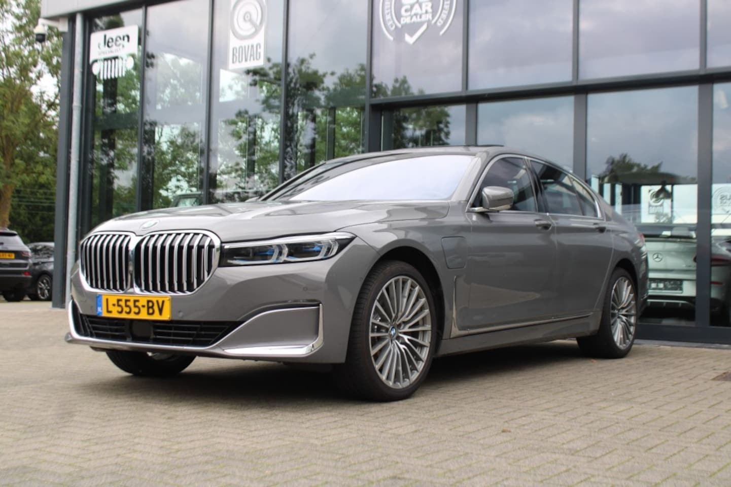 BMW 7-serie - 745E HIGH EXECUTIVE Soft-Close, HUD, Schuifdak active steering - AutoWereld.nl