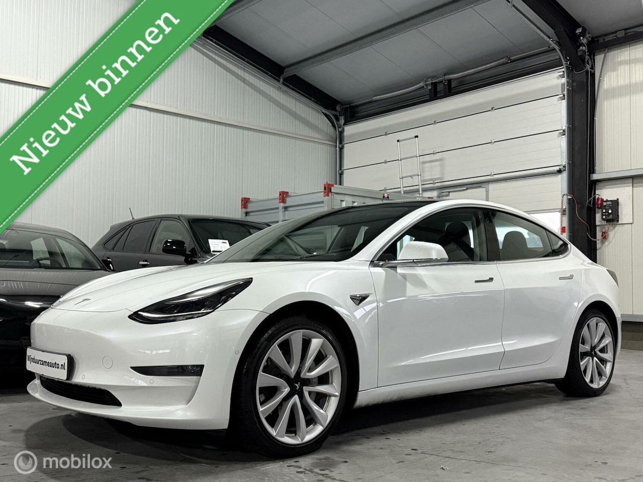 Tesla Model 3 - Long Range RWD Long Range AWD 75 kWh - trekhaak - incl. BTW - AutoWereld.nl