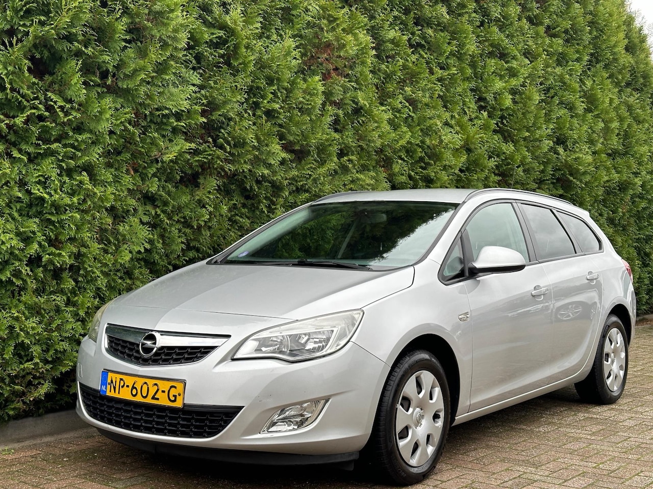 Opel Astra Sports Tourer - 1.4 Turbo Edition Trekhaak Airco - AutoWereld.nl