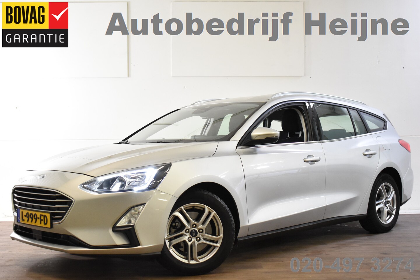 Ford Focus Wagon - 1.0 ECOBOOST BUSINESS NAVI/LED/CAMERA - AutoWereld.nl