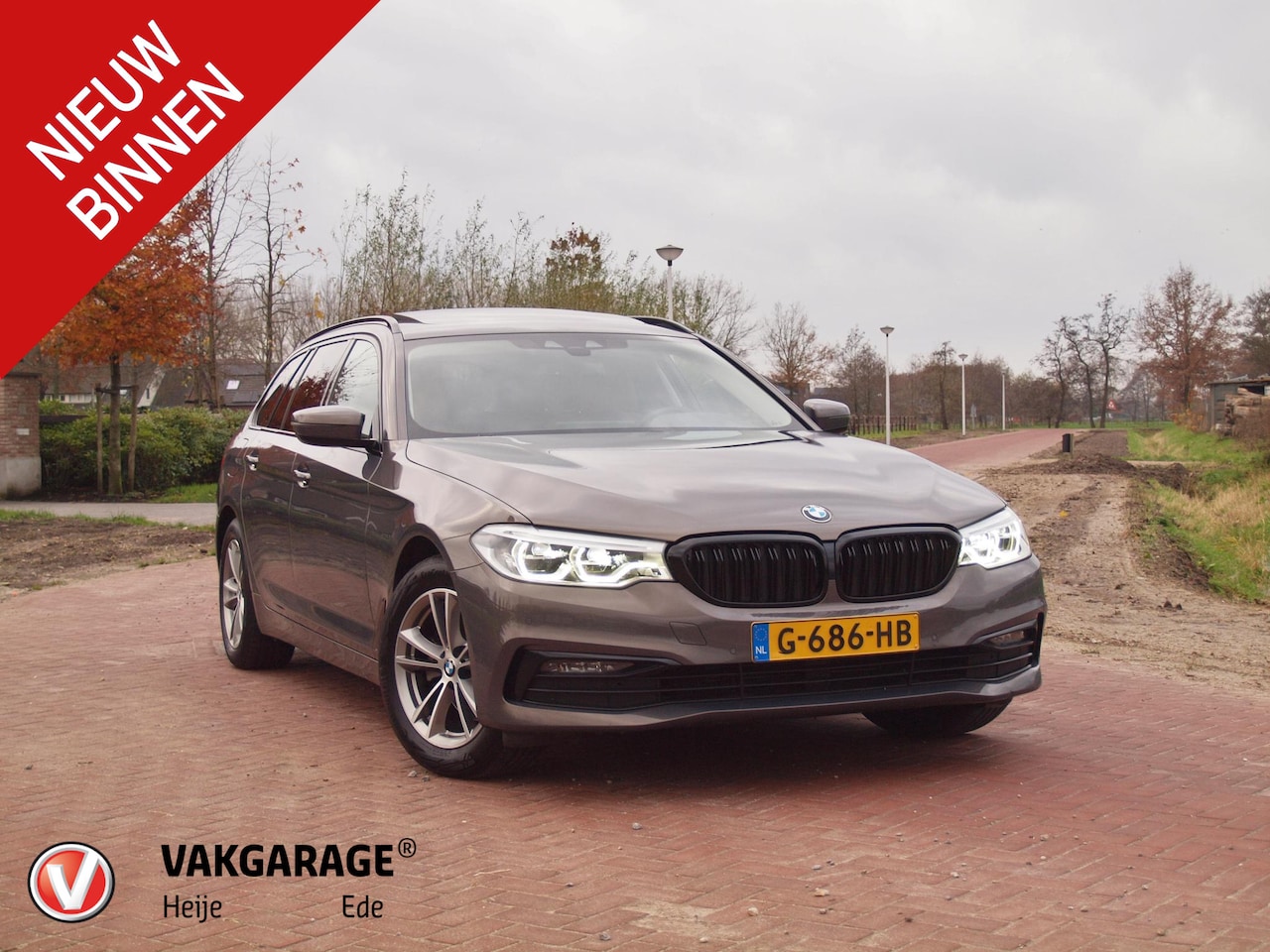 BMW 5-serie Touring - 520i High Executive Edition | Panoramadak | Lederen Bekleding | Led koplampen | NL-Auto | - AutoWereld.nl