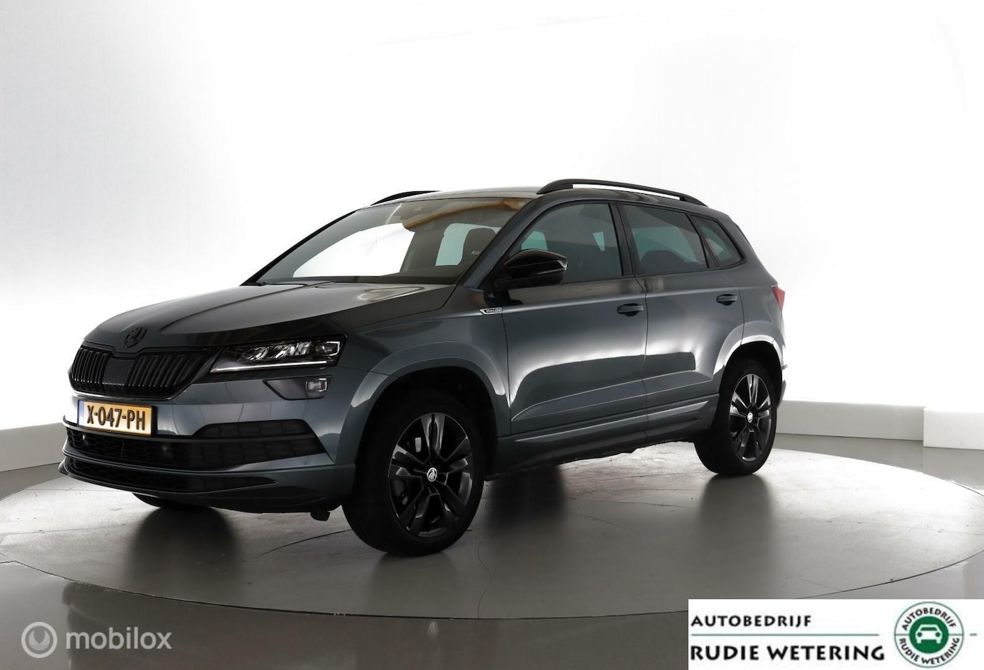 Skoda Karoq - 1.5 TSI ACT Automaat Sportline Business trekhaak|led|nav|cam|ecc|acc|lmv18 - AutoWereld.nl