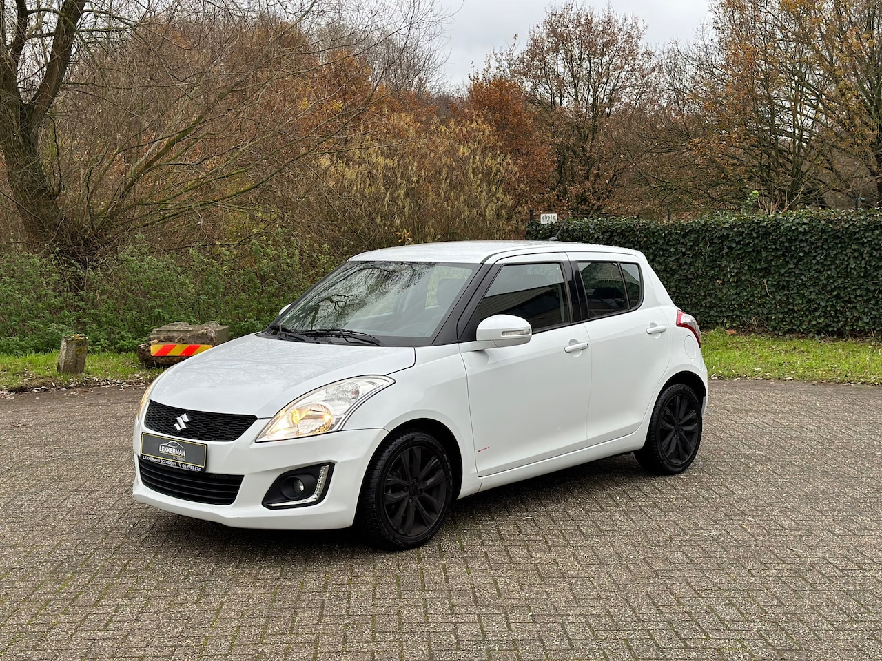 Suzuki Swift - 1.2 Exclusive EASSS SPORT I CRUISE I VOLL ONDERHOUD I ZEER MOOI - AutoWereld.nl