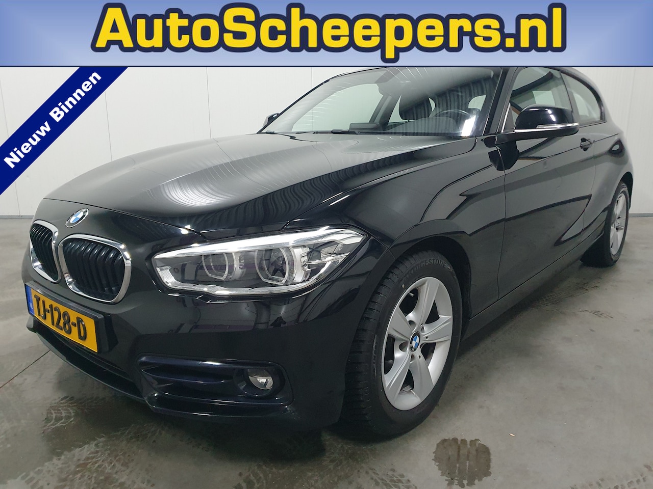 BMW 1-serie - 118i Executive NAVI/CRUISE/CLIMA/LMV - AutoWereld.nl