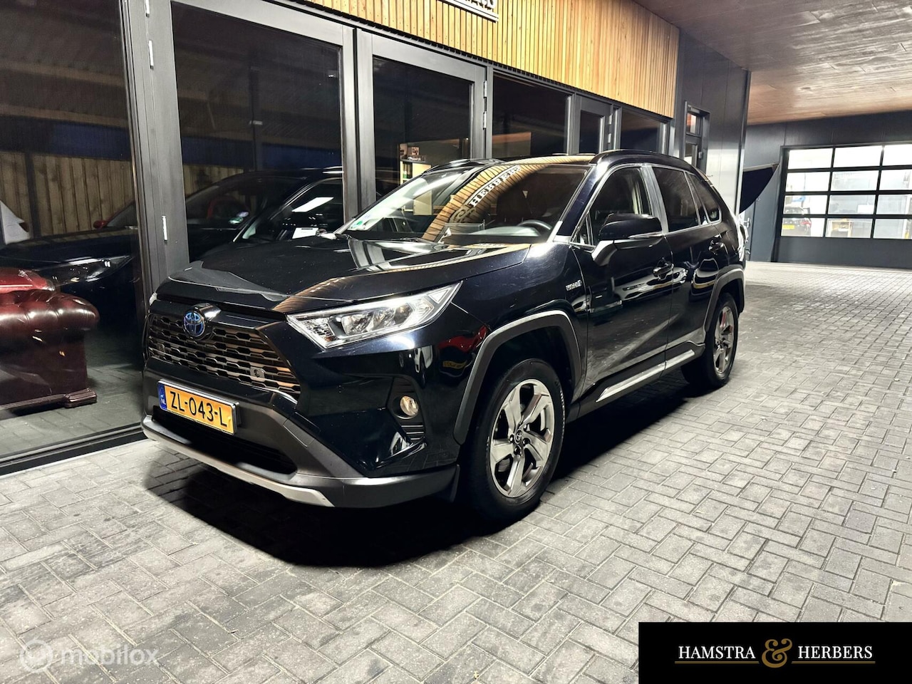 Toyota RAV4 - 2.5 Hybrid Business Intro zwart/blauw - AutoWereld.nl