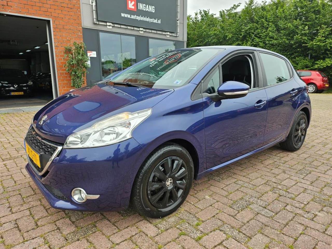 Peugeot 208 - 1.2 VTi Envy NAVI PDC - AutoWereld.nl