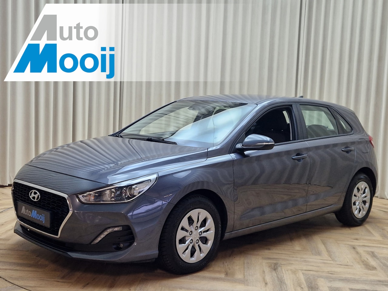 Hyundai i30 - 1.4 *Stoelverwarming* Apple-Carplay / Camera / Cruise Control / Navigatie / Airco / Dealer - AutoWereld.nl