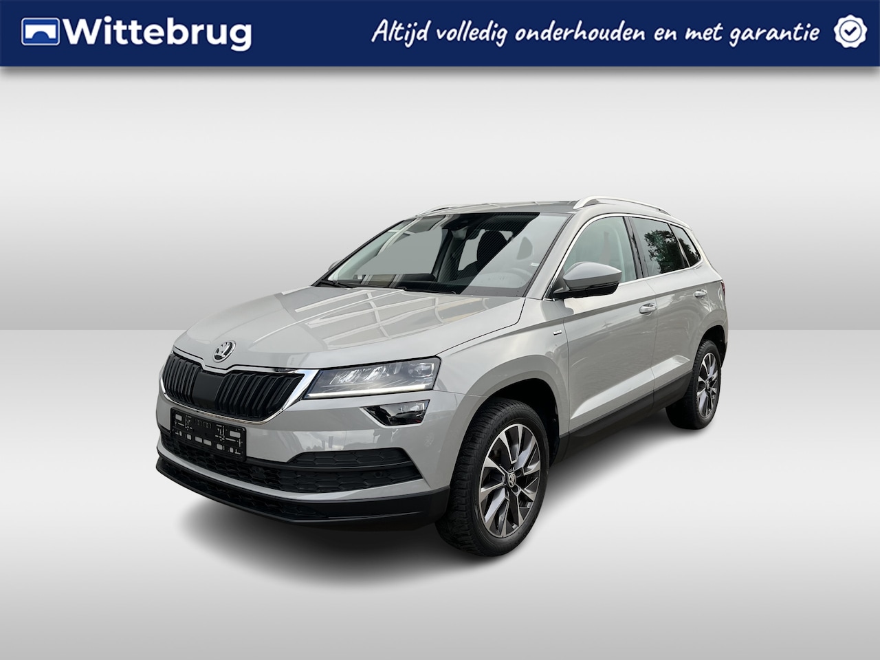 Skoda Karoq - 1.5 TSI Ambition Drive 125 / AUTOMAAT/ TREKHAAK/ VARIOFLEX/ PARK. SENSOREN/ LED/ CRUISE/ S - AutoWereld.nl