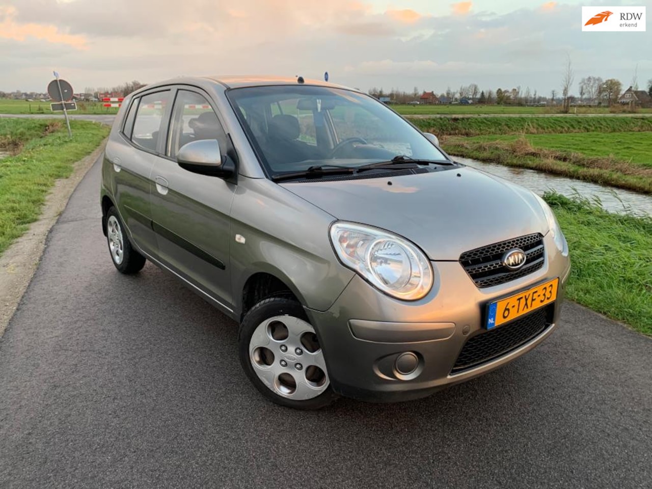 Kia Picanto - 1.0 X LAGE KM - AutoWereld.nl