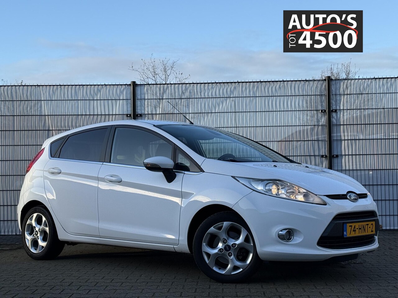 Ford Fiesta - 1.4 Titanium Trekhaak/Clima - AutoWereld.nl